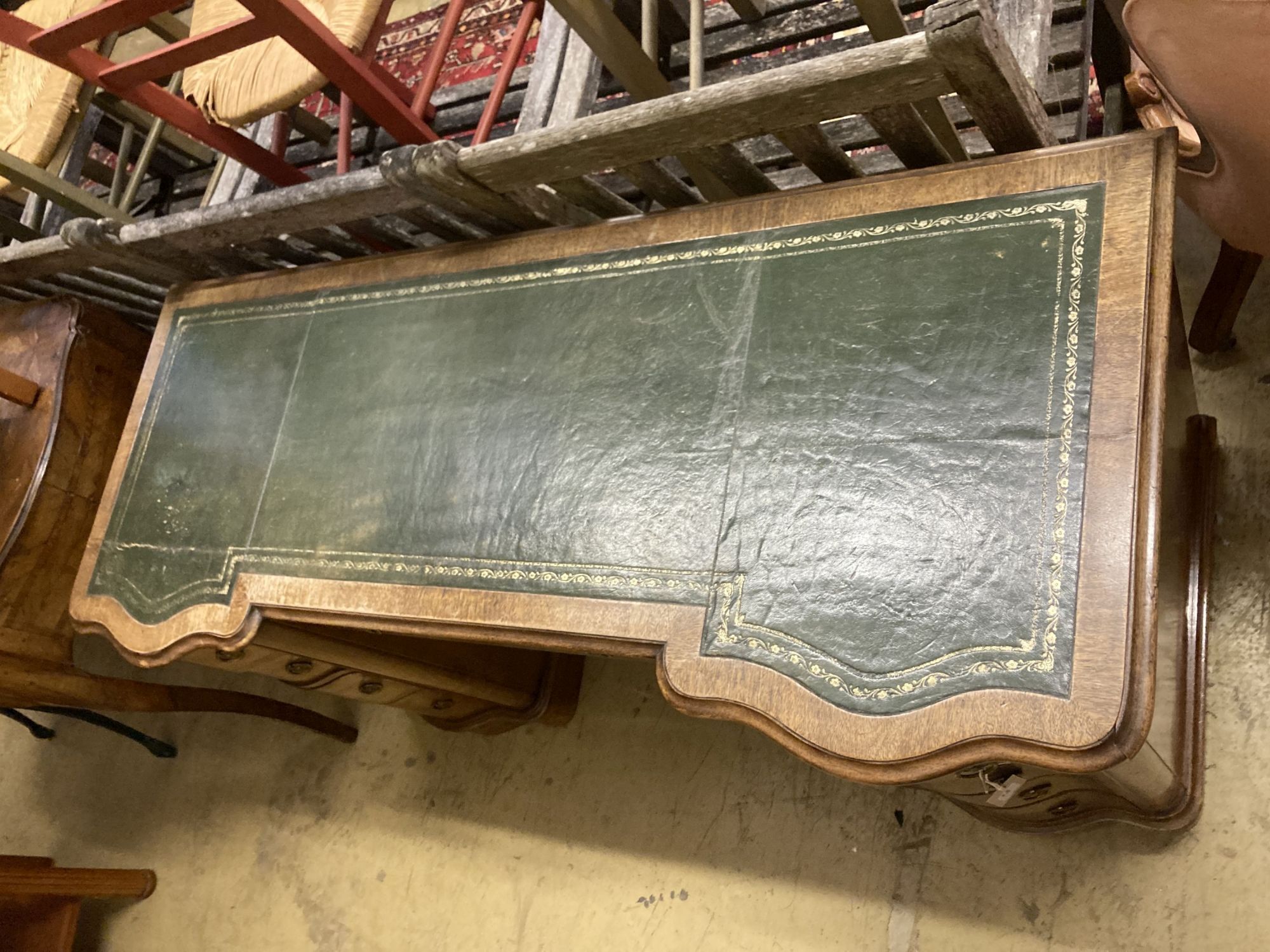 A Victorian style mahogany pedestal kneehole desk, width 138cm, depth 56cm, height 72cm